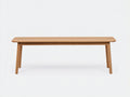Banc 155×36×45 cm - chêne blond - plateau aux bords adoucis et quatre pieds inclinés pour salle à manger